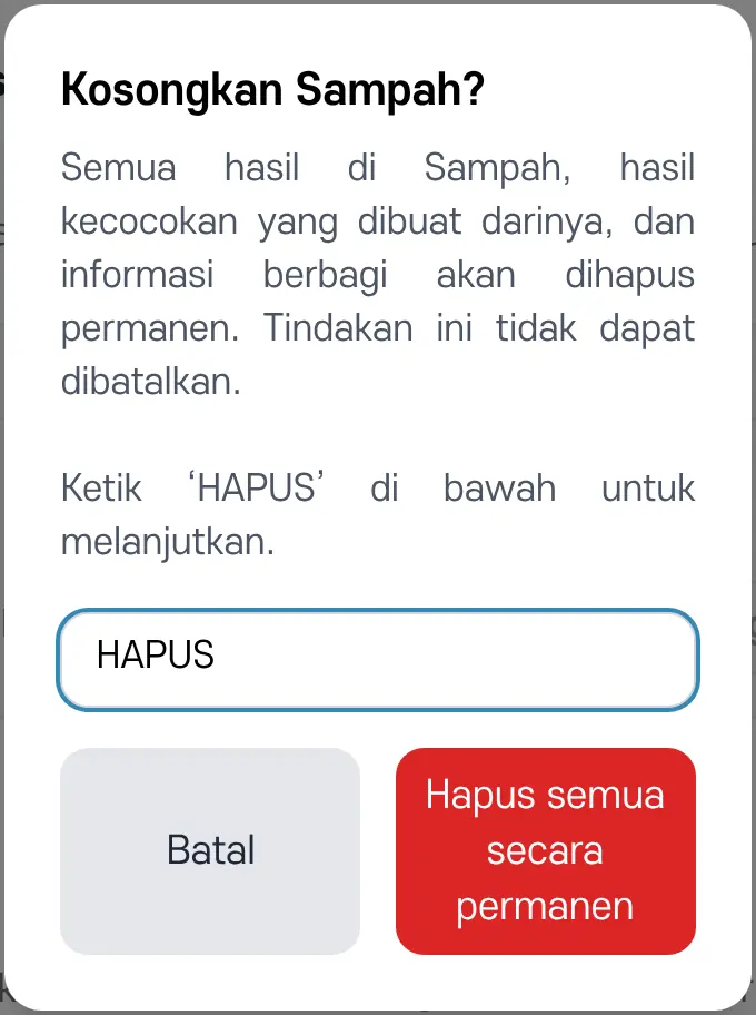 Jendela konfirmasi Kosongkan Sampah. Tombol baru bisa diketuk setelah Anda mengetik 'HAPUS'